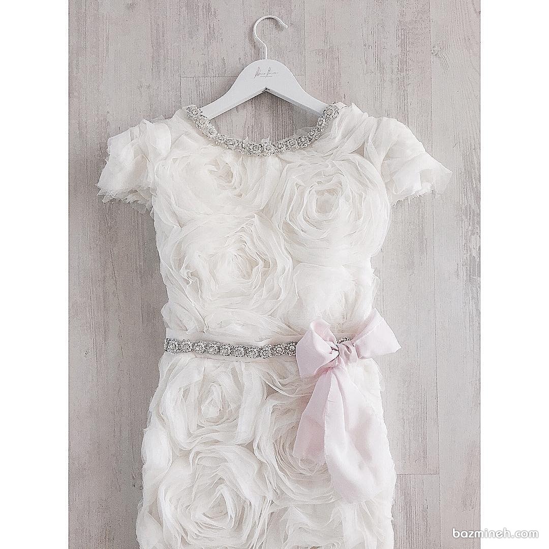 پیراهن دخترانه سفید با گل های برجسته توری مناسب برای تولد