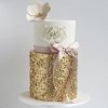 کیک سفید طلایی پاپیون دار مناسب برای جشن تولد