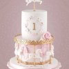 کیک فوندانت جشن تولد دخترانه با تم کراسل (چرخ و فلک اسب دار)