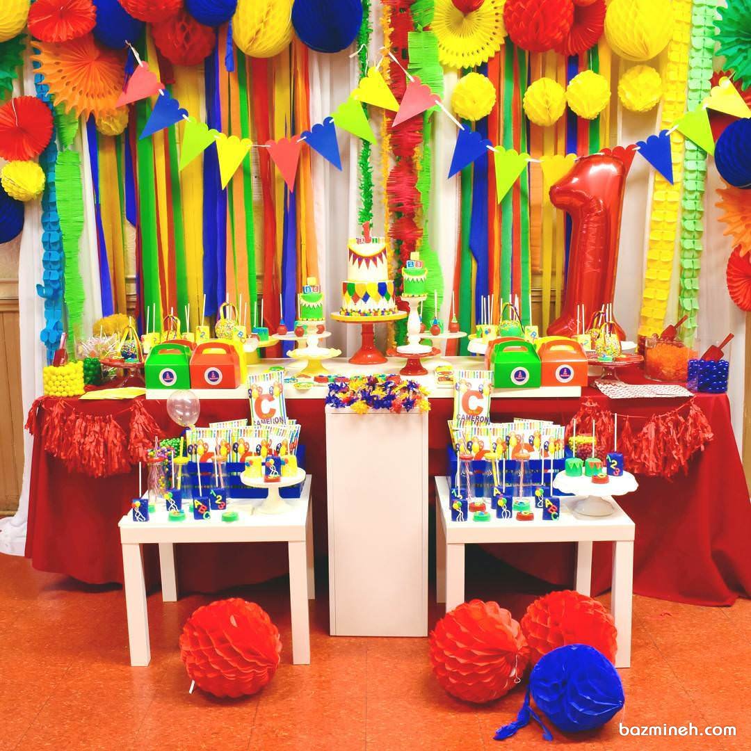 دکوراسیون شاد و رنگی جشن تولد یکسالگی کودک با تم رنگارنگ