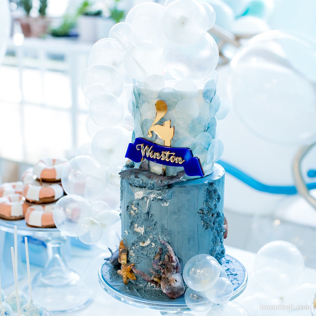 کیک دو طبقه جشن تولد چهار سالگی کودک با تم موجودات دریایی 
