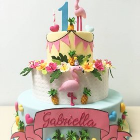 کیک فوندانت جشن تولد یکسالگی دخترانه با تم پرنده صورتی فلامینگو