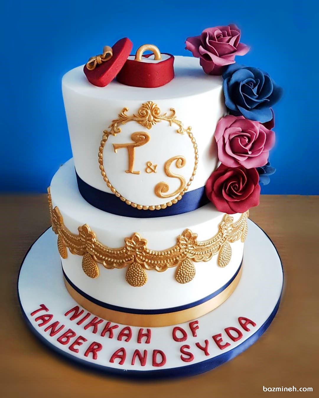 کیک دو طبقه زیبای جشن نامزدی با تزیین فوندانت حلقه نامزدی