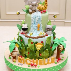 کیک فانتزی فوندانت جشن تولد کودک با تم حیوانات جنگل