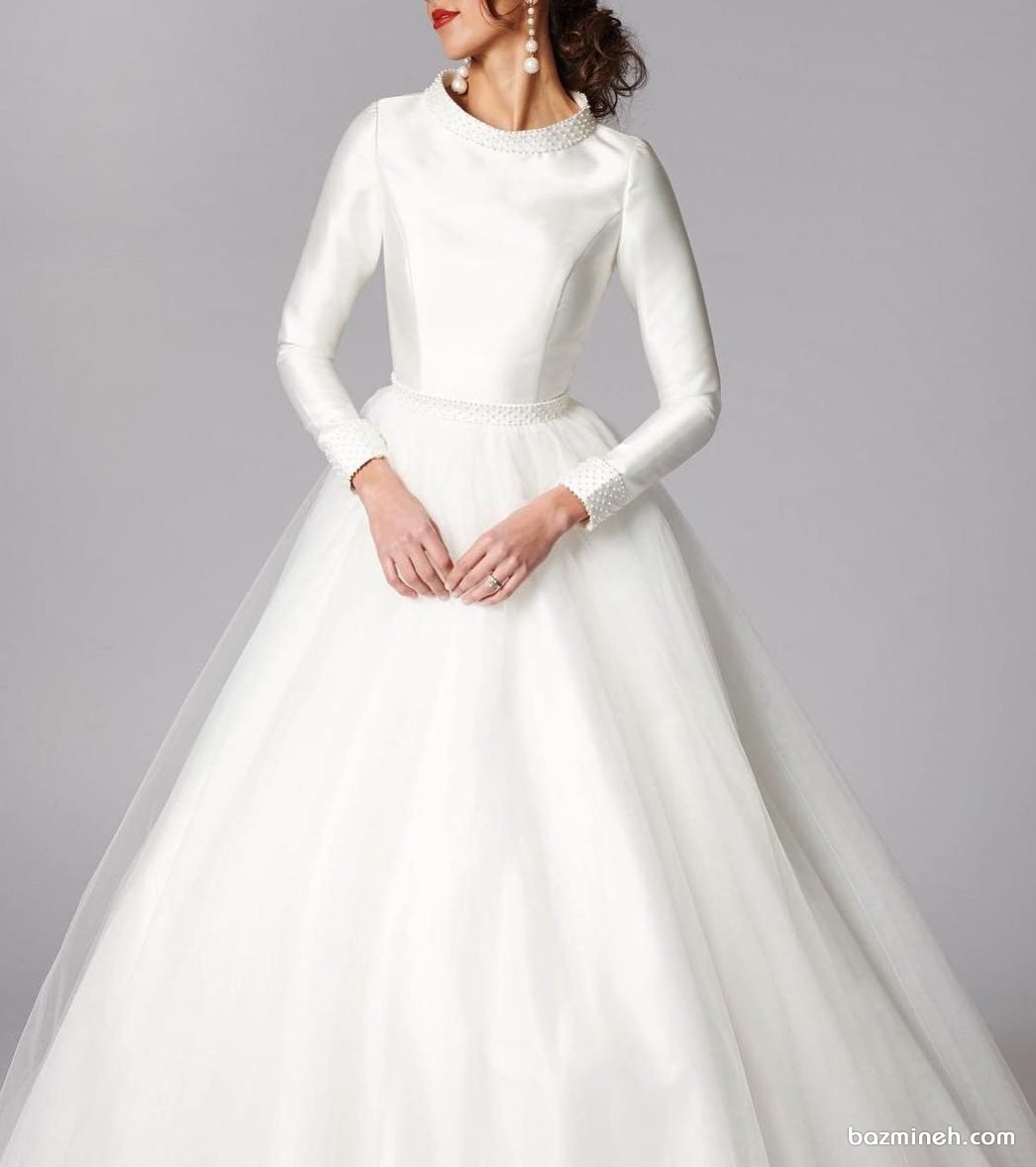 مدل بالا تنه ساده و شیک لباس عروس پوشیده آستین دار با پارچه تافته مروارید دوزی شده 