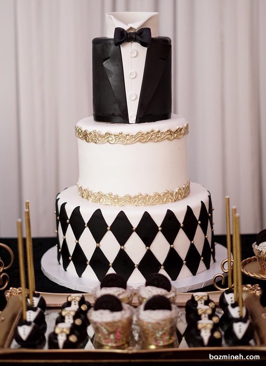 کیک سه طبقه فوندانت جشن تولد پسرانه با تم پاپیون سفید مشکی طلایی
