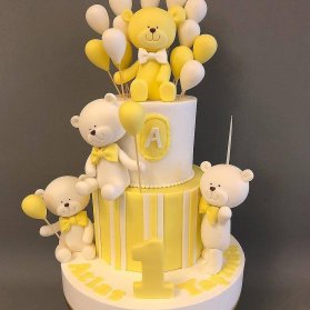 کیک فوندانت عروسکی جشن تولد کودک با تم خرسی سفید زرد