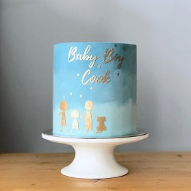 کیک زیبای جشن بیبی شاور پسرونه با تم آبی طلایی