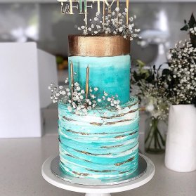 کیک چند طبقه جشن تولد بزرگسال با تم آبی طلایی