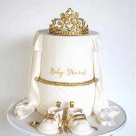 کیک دو طبقه زیبای جشن بیبی شاور یا تعیین جنسیت با تم سفید طلایی
