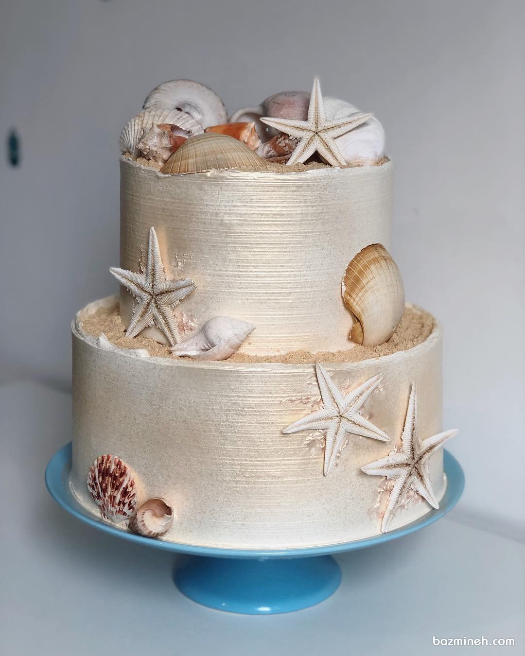 کیک دو طبقه جشن تولد بزرگسال با تم صدف و ستاره دریایی