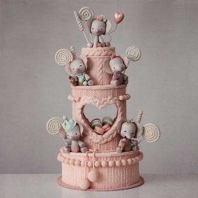کیک چند طبقه فوندانت جشن تولد کودک با تم زمستونی بافتنی و فیل کوچولو
