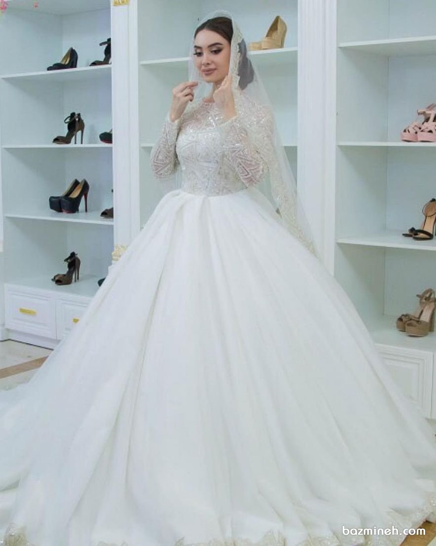 لباس عروس آستین بلند با تور حاشیه دوزی شده