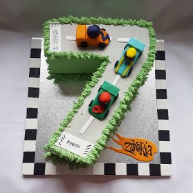 کیک جشن تولد هفت سالگی پسرونه با تم مسابقات رالی