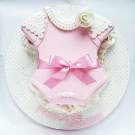 کیک جشن تولد یا بیبی شاور دخترونه با تم لباس بادی